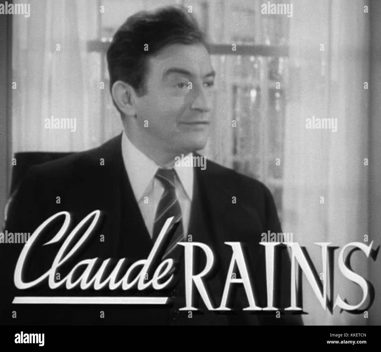 Claude Rains tritt im Trailer des Filmklassikers Now Voyager auf und zeigt seine Rolle in diesem amerikanischen Drama von 1942. Der Film ist bekannt für seine dramatischen Darbietungen und Geschichten. Stockfoto