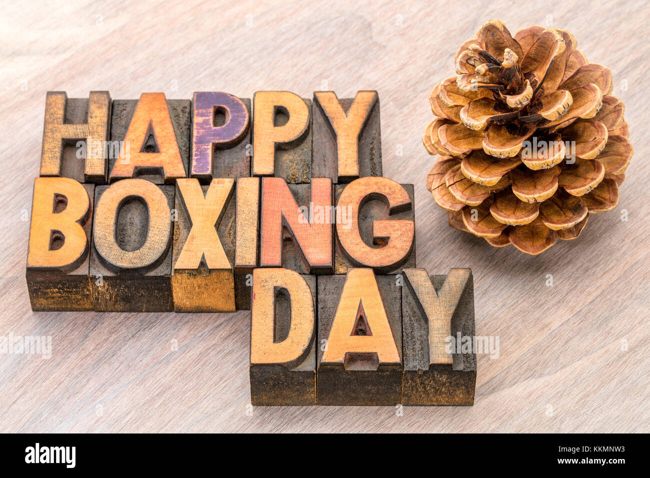 Happy Boxing Day word Abstract in Vintage buchdruck Holz Typ wityh Pine Cone Stockfoto