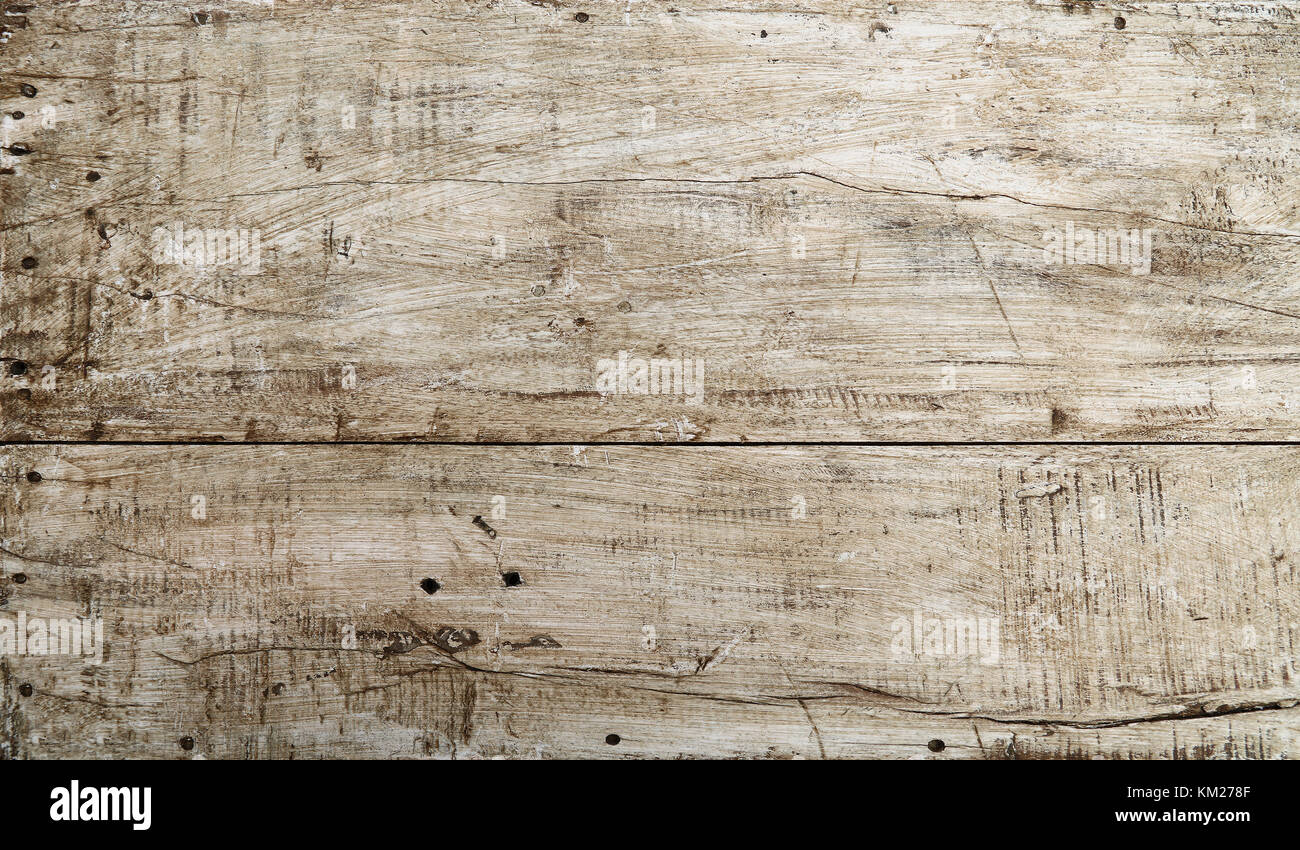 Grunge Hintergrund Textur aus weiß lackiertem Holz mit Dunkelbraun und Schwarz dirty Flecken, Kratzer und Risse Stockfoto