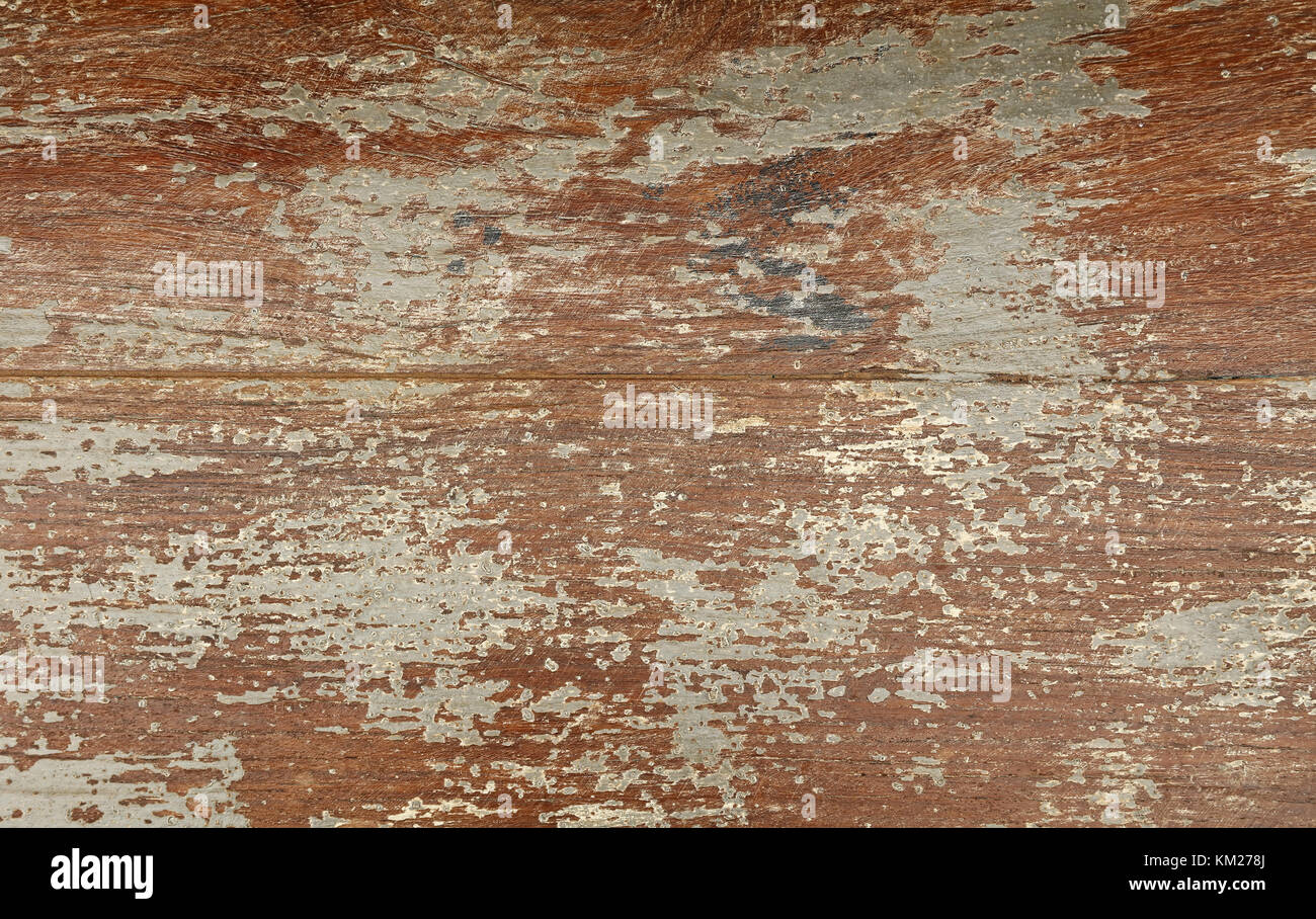 Grunge Hintergrund Textur von braun und grau lackiertem Holz mit schmutzigen Flecken, gebürstet, Kratzern und Rissen. Stockfoto
