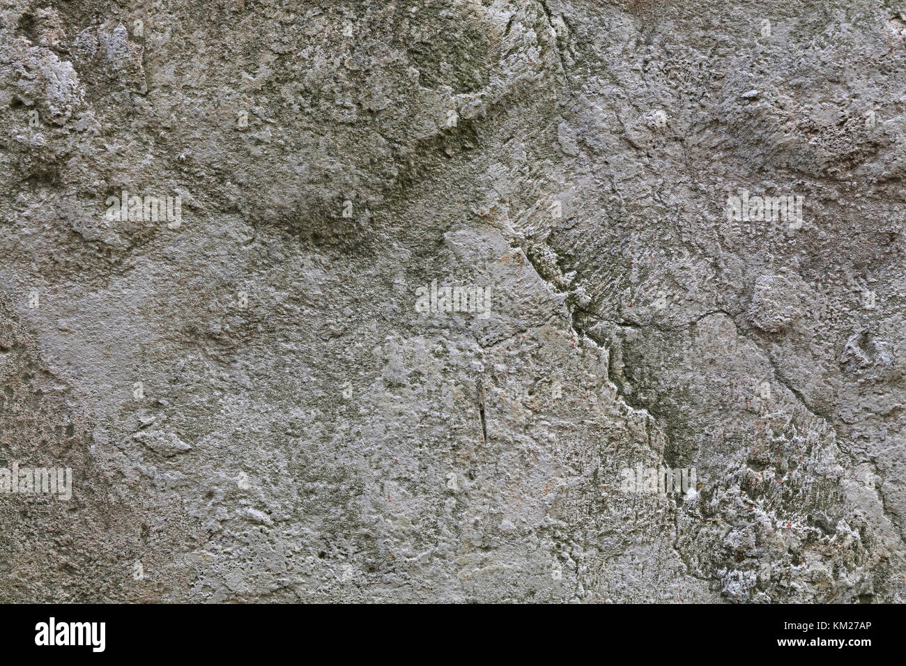 Grauen und weißen groben Naturstein Oberfläche grunge Hintergrund Textur Nahaufnahme Stockfoto