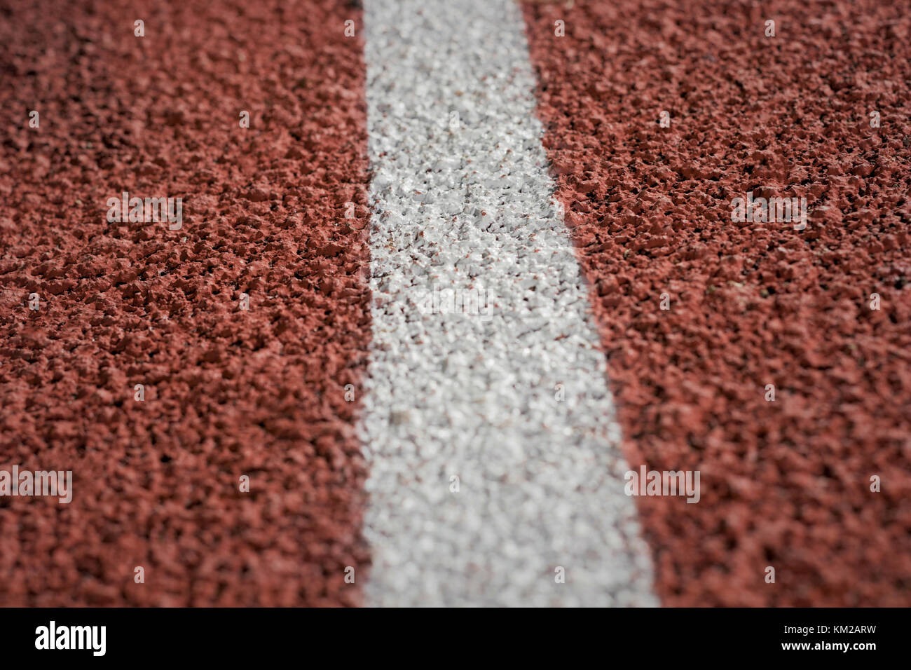 Laufbahn hautnah. geringe Tiefenschärfe. Sport Hintergrund. Stockfoto