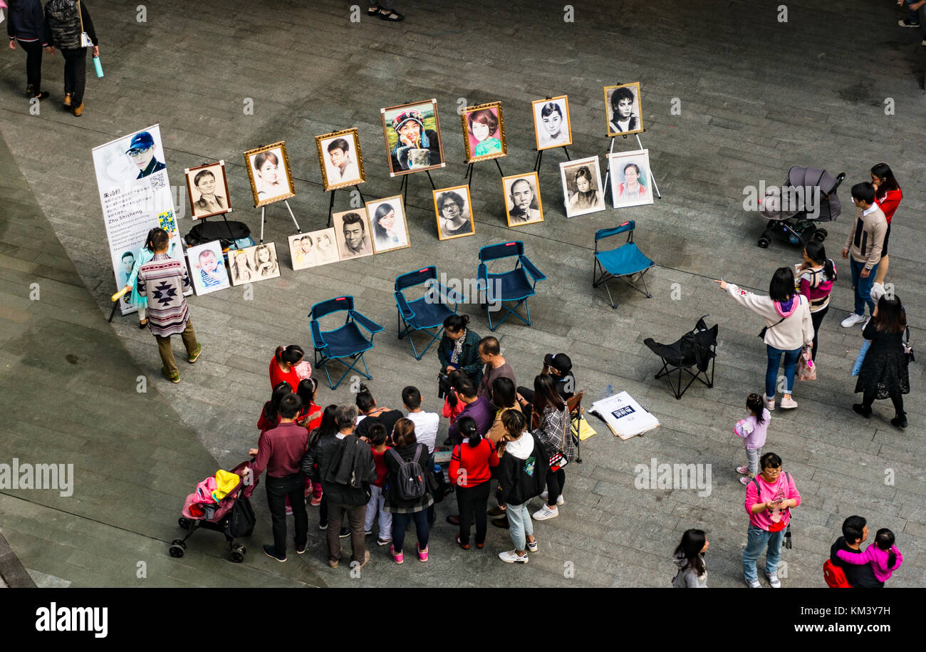 Straße Künstler bei der Arbeit an einem öffentlichen Platz in Shenzhen, China Stockfoto