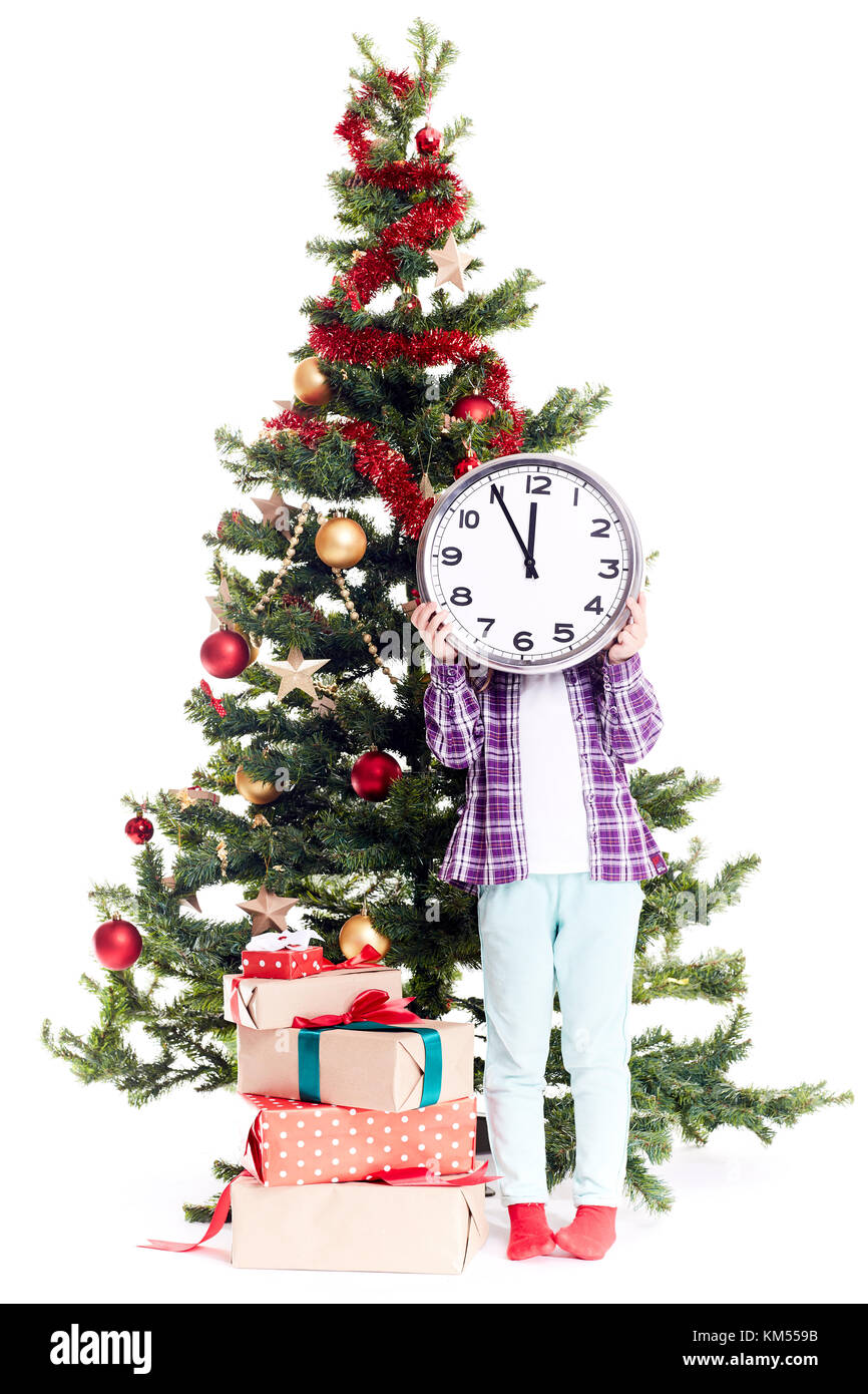 Mädchen in der Nähe von Weihnachten Baum Stockfoto