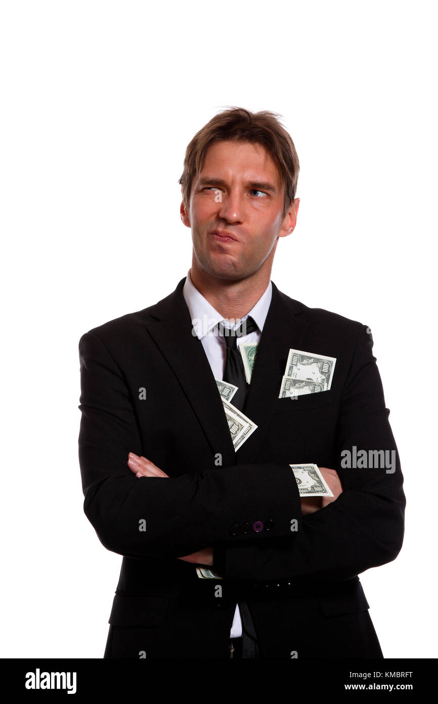 Foto von Mann in Anzug mit Geld in den Taschen Stockfoto