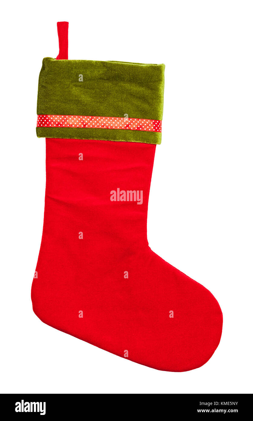 Rot und Grün Samt Weihnachtsstrumpf isoliert auf einem weißen Hintergrund. Stockfoto