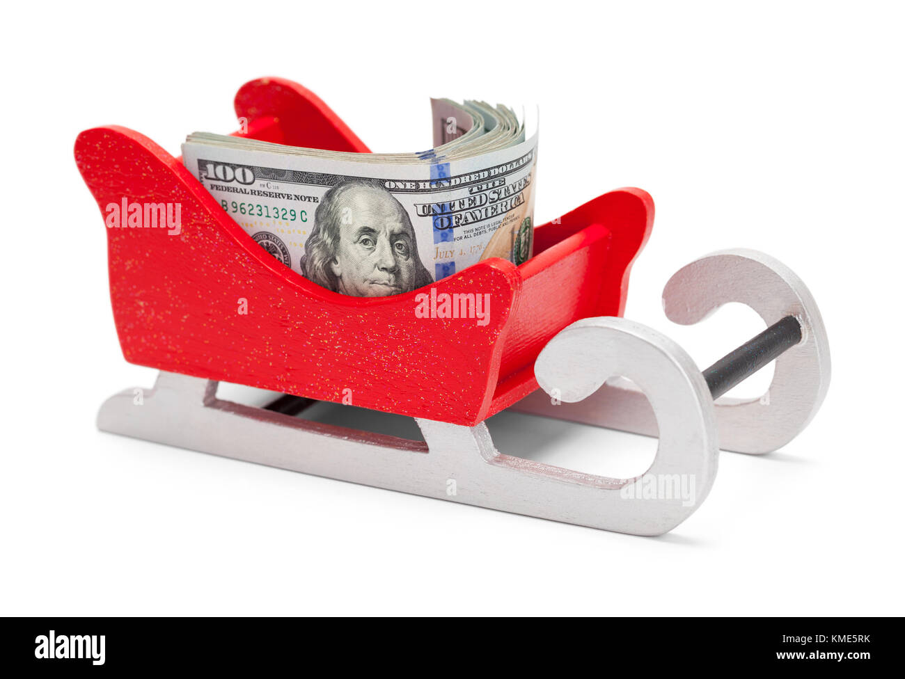 Santa Claus Weihnachten Schlitten mit Geld isoliert auf einem weißen Hintergrund. Stockfoto