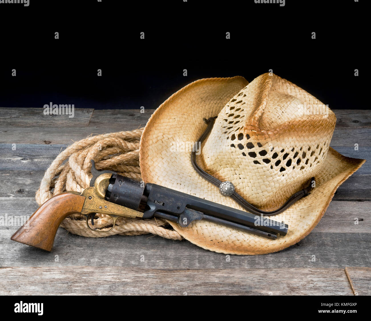 Cowboy Pistole, Strohhut und Seil mit Raum für ihren Typ. Stockfoto