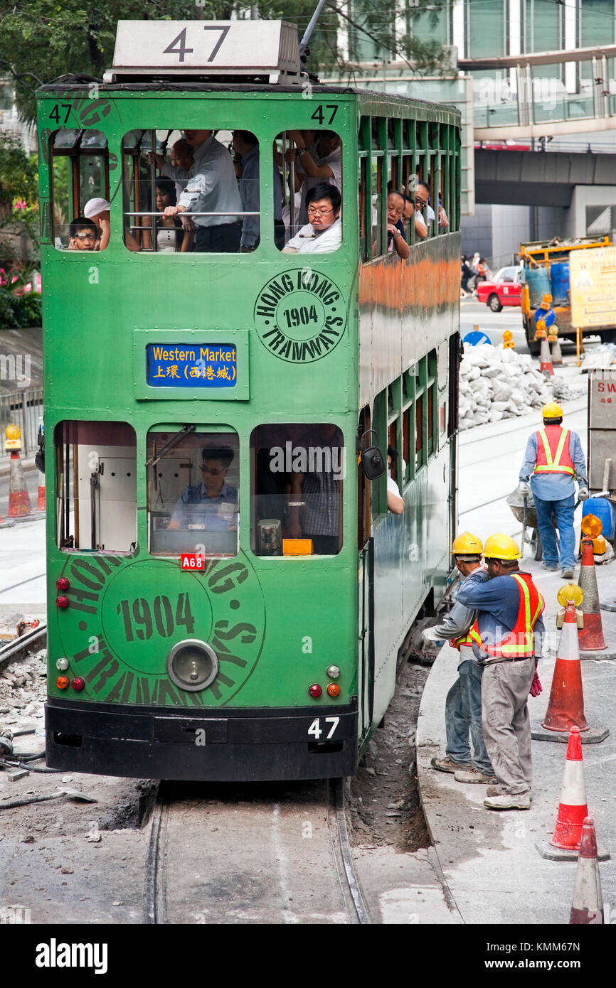 Straßenbauarbeiten auf der Strassenbahn, der Insel Hong Kong, SAR, China Stockfoto