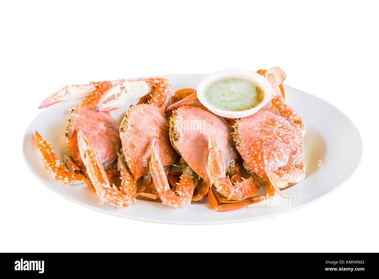 4 frische gedämpfte Krabben mit leckeren Soße serviert. Stockfoto