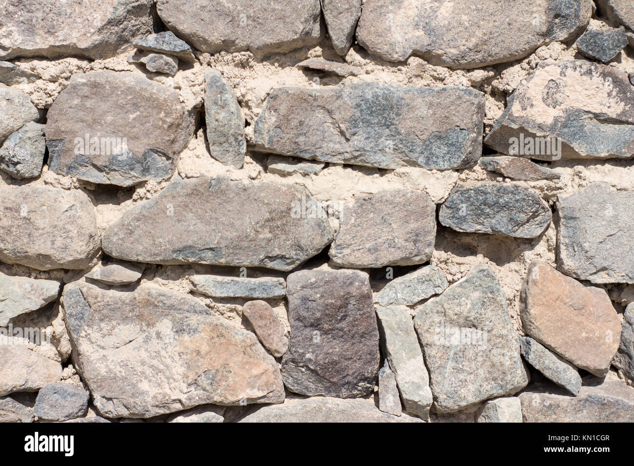 Fort festen Stein Wand Textur mit Sand sandwich Textur nasse Erde behält sich vor, für den Bau und für die Dekoration Zweck Farbe grau Groß und Klein verwendet Stockfoto