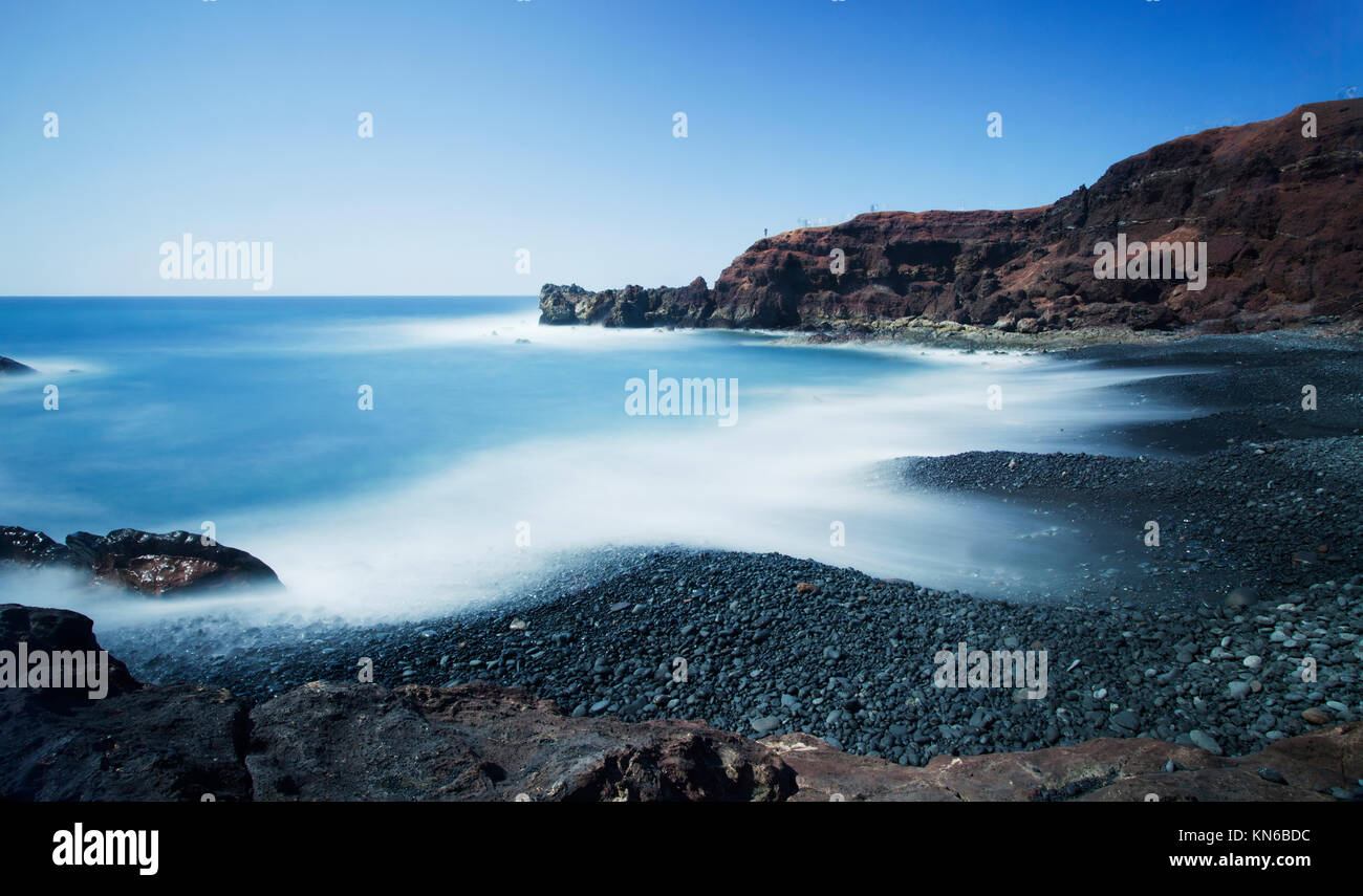 Langzeitbelichtung von El Golfo, Lanzarote, Kanarische Inseln, Spanien Stockfoto