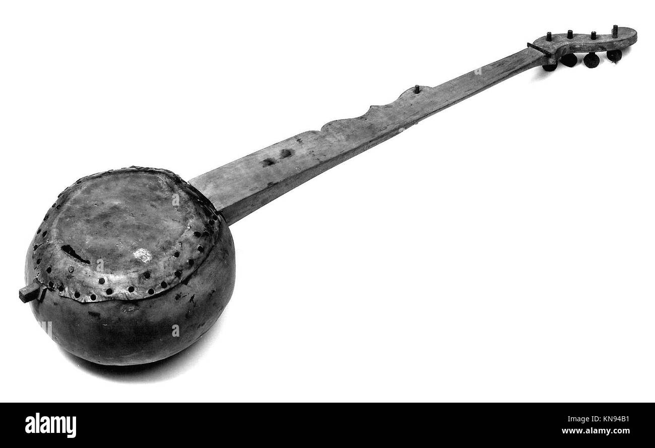 Ein Banjo aus der MET-Sammlung, ein Streichinstrument mit ausgeprägter Klang- und Kulturbedeutung, das die Entwicklung von Musikinstrumenten veranschaulicht. Stockfoto