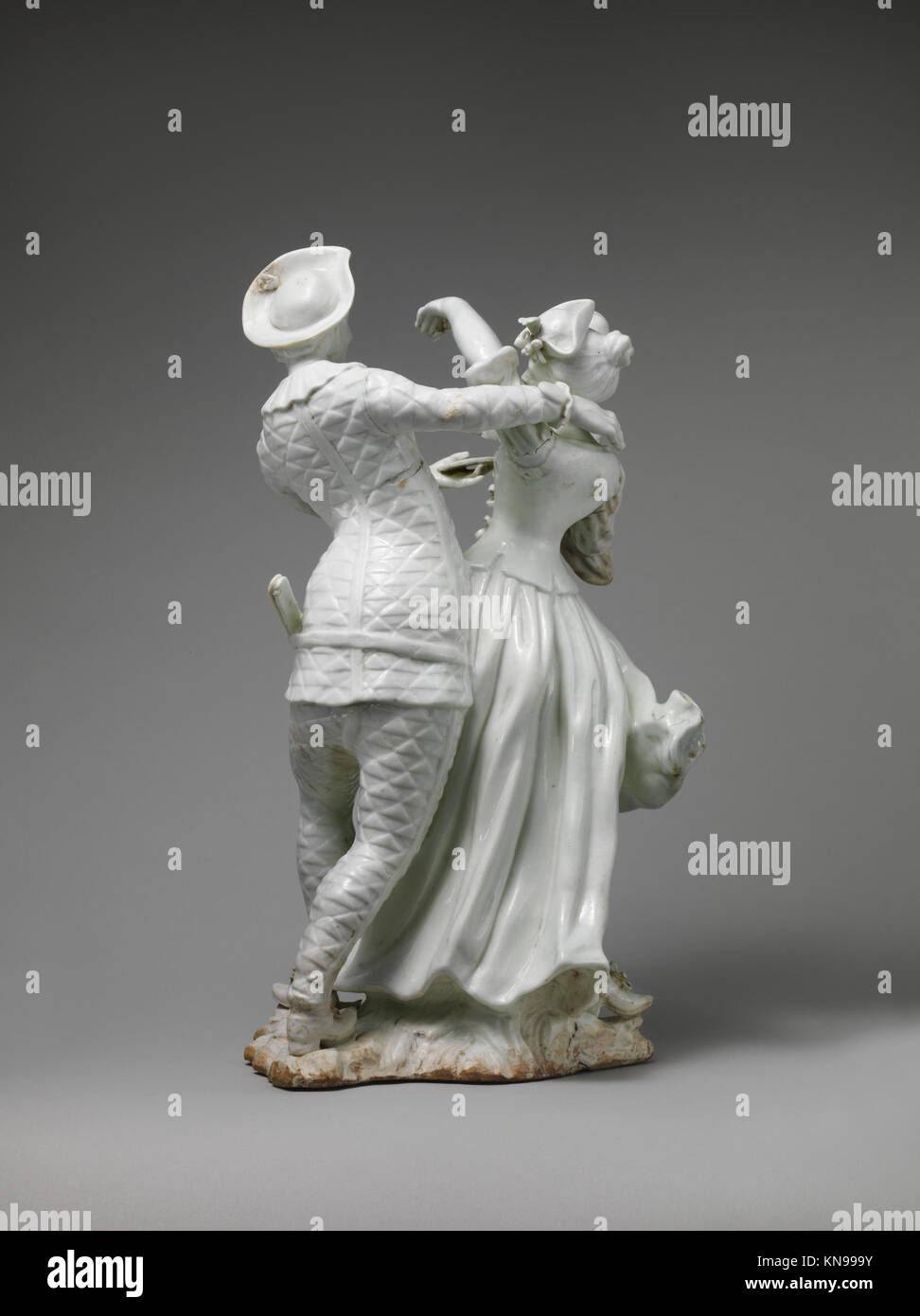 Ein Gemälde der Familie Harlequin mit farbenfrohen Kostümen und ausdrucksstarken Posen, das italienische Theatertraditionen aus dem 18. Jahrhundert in Commedia dell'arte veranschaulicht. Stockfoto