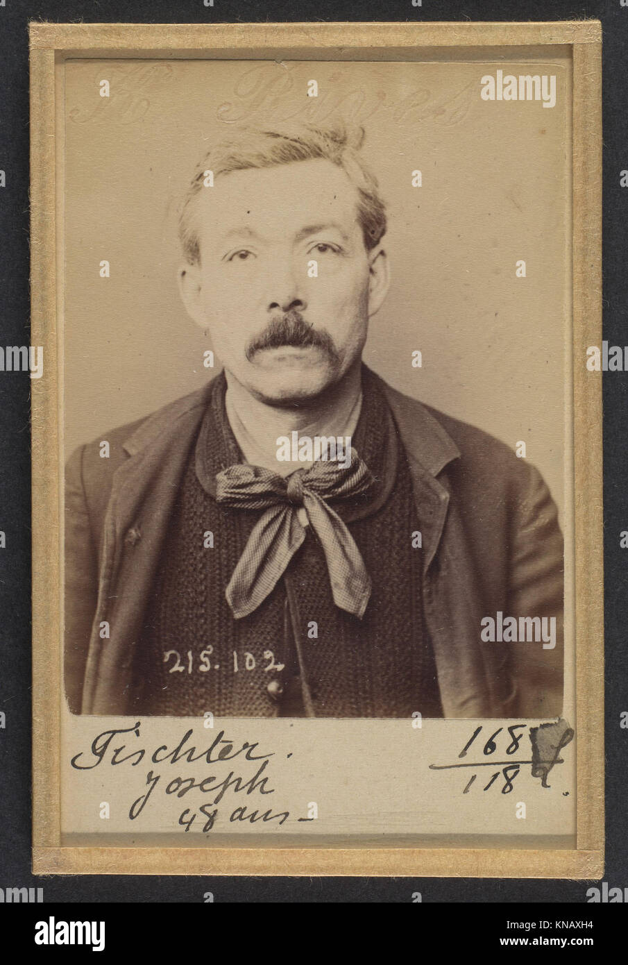 Aufzeichnungen über Joseph Fischter, einen 47-jährigen Anarchisten und Tapetendrucker aus Paris, vom 4. März 1894, dokumentieren seinen Beruf und seine politische Zugehörigkeit. Stockfoto