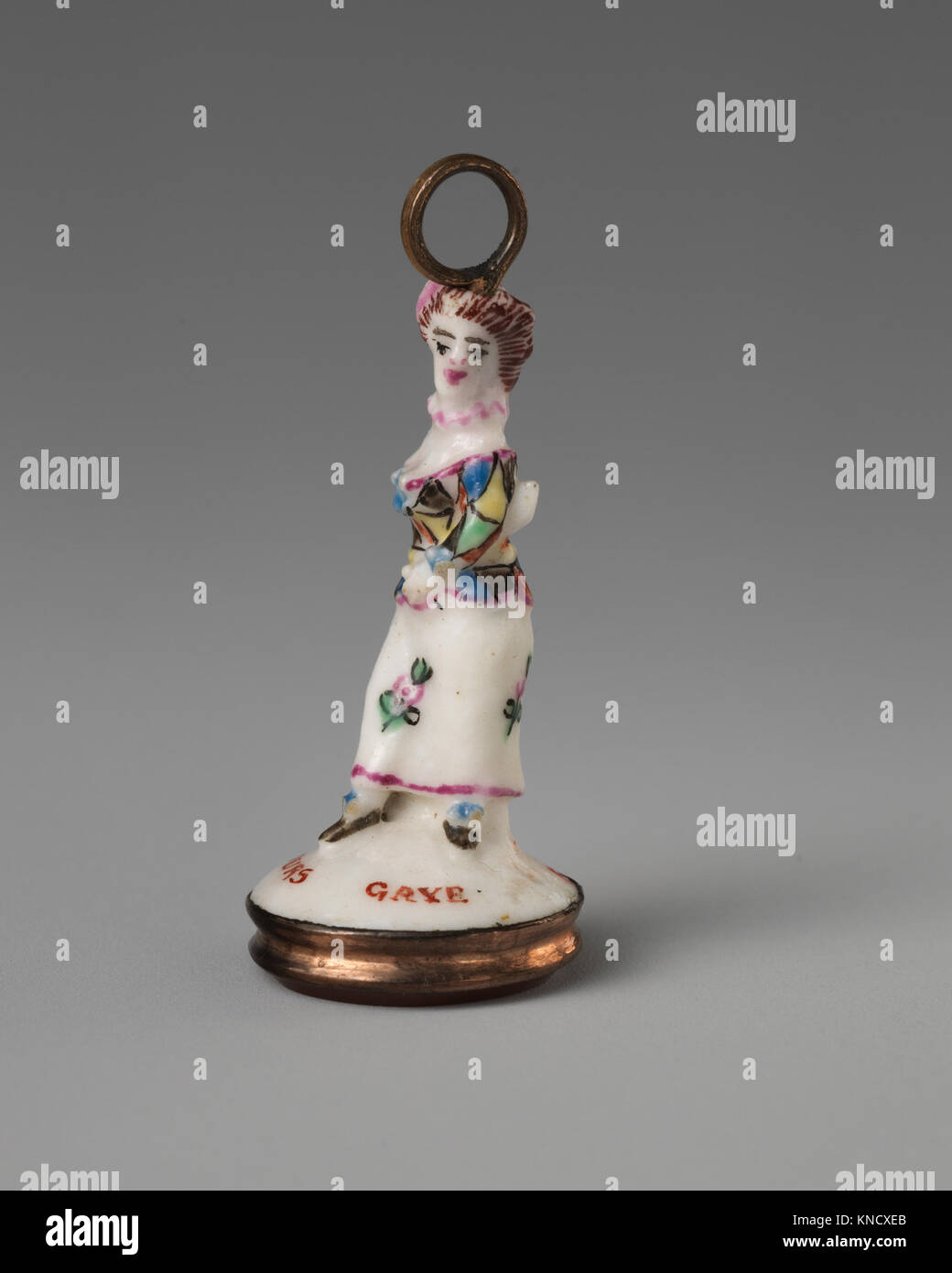 Dieses Kunstwerk stellt Columbine aus Commedia dell’arte dar und betont ausdrucksstarke Bewegung, Kostüme und Theatertradition. Stockfoto