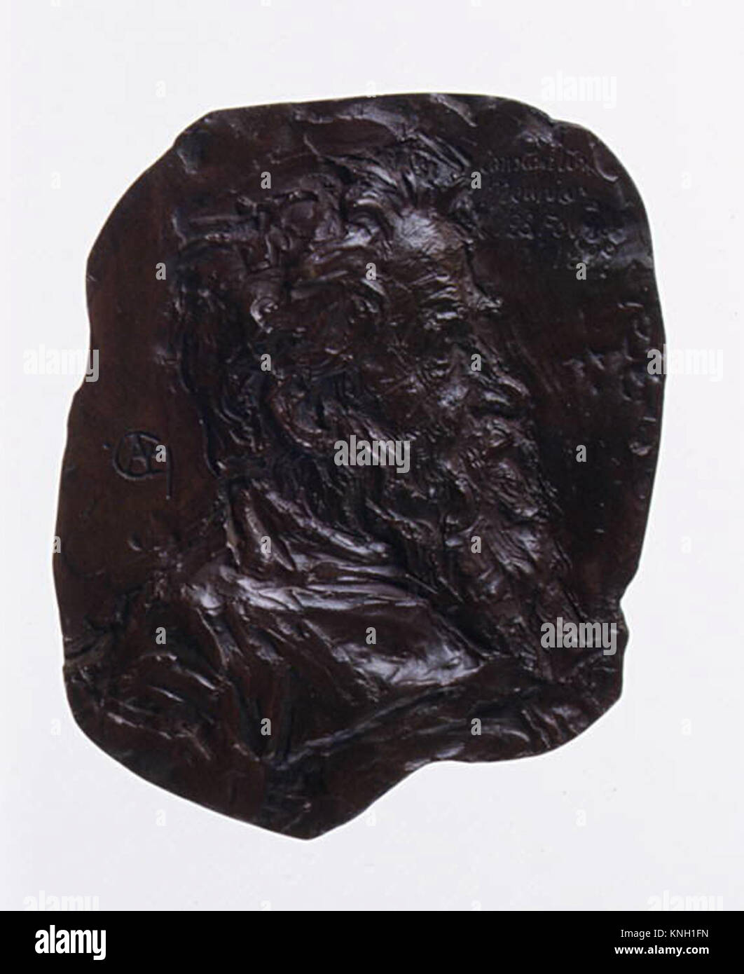 Diese Skulptur von Constantin Meunier beleuchtet Themen der Industrie und der Arbeiterklasse, die für seinen Stil des Sozialrealismus im späten 19. Und frühen 20. Jahrhundert charakteristisch sind. Das Bronzestück ist ein Beispiel für handwerkliches Geschick und menschlichen Ausdruck in einem historischen europäischen Kontext. Stockfoto