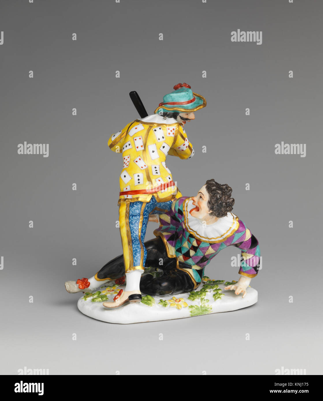 Ein Gemälde, das Harlequin-Figuren zeigt, die im Kampf verwickelt sind, und den Theaterstil der Commedia dell'arte und dynamische Charaktere in der italienischen Theatertradition veranschaulicht. Stockfoto