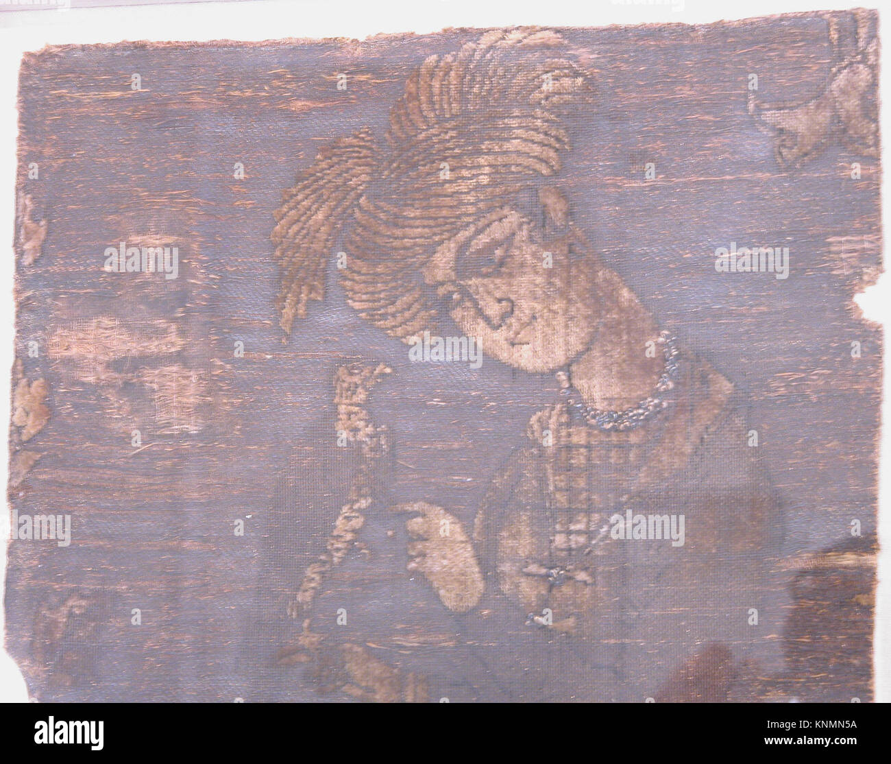 Eine Illustration eines jungen Mannes, der sich um einen Falken kümmert, zeigt die Falknerei als historische Aktivität, aufbewahrt im Metropolitan Museum of Art Stockfoto