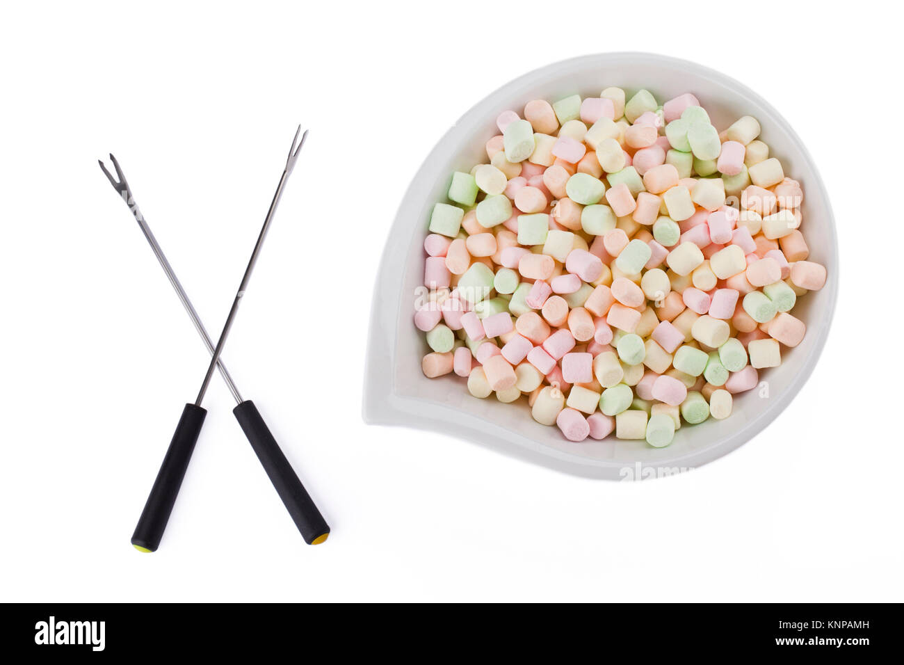 Marshmallows mit einem Stock Stockfoto