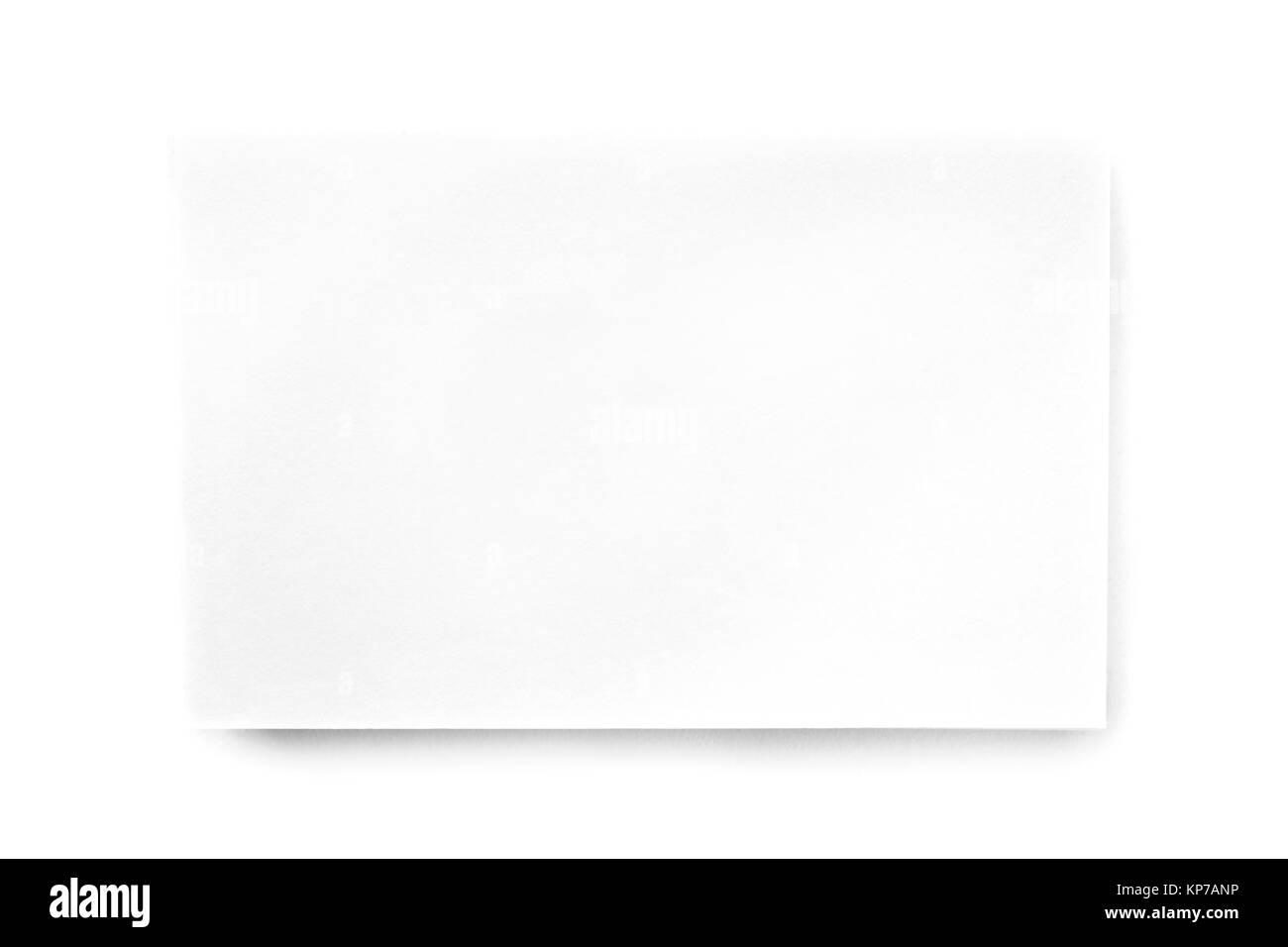 Ein overhead Mockup einer leeren weißen Visitenkarte, geschossen von oben auf einen weißen Hintergrund, mit einem Platz für Text Stockfoto