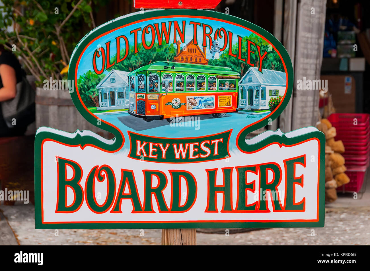 Altstadt Trolley Key West Board hier Zeichen für Anschlag auf Stadtbesichtigung, Key West, Florida Stockfoto