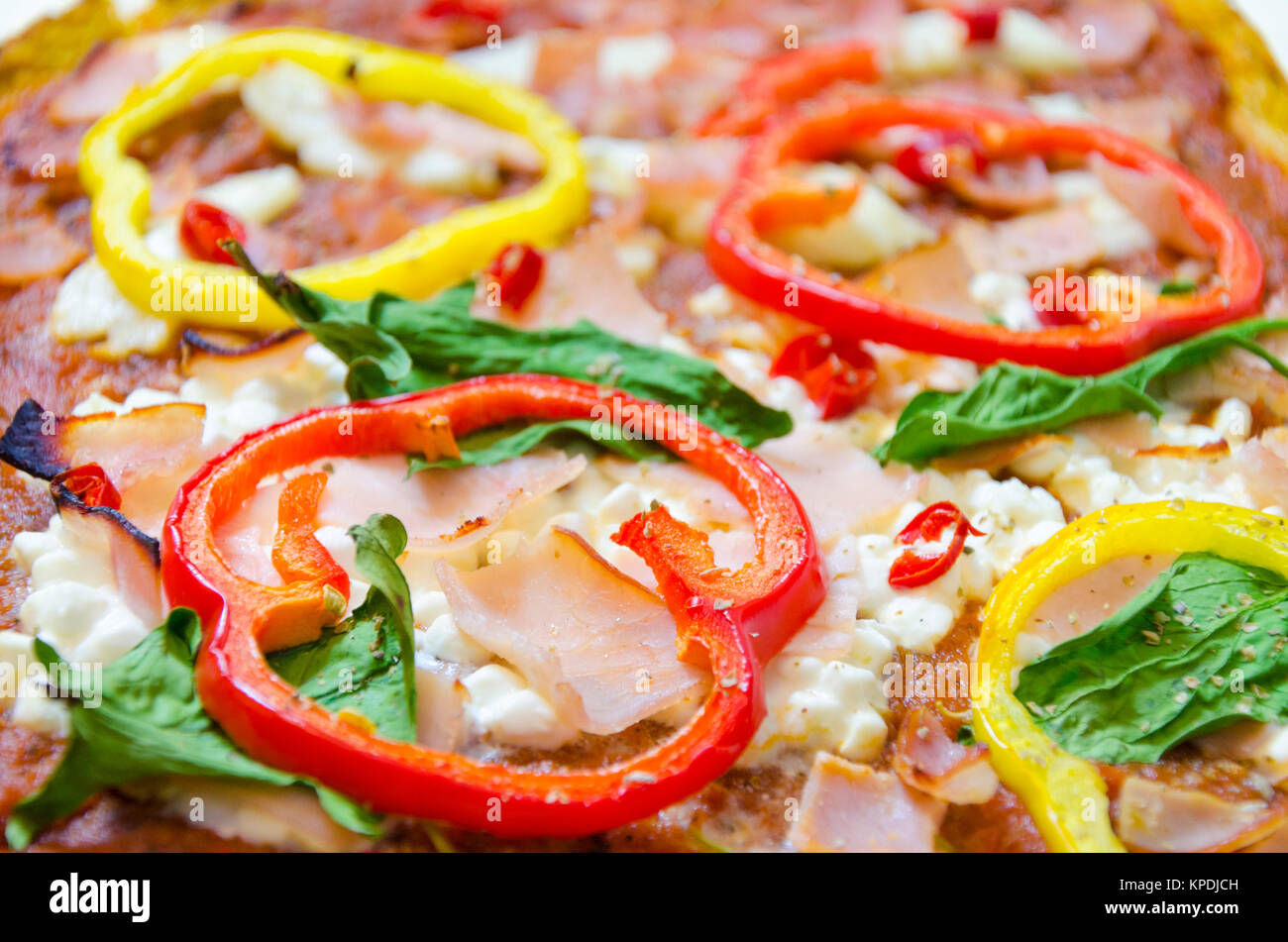 Pizzabelag Stockfoto