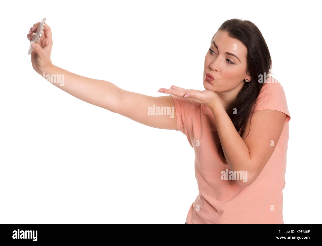 Junge Frau mit einem Schmollen und macht einen selfie Stockfoto