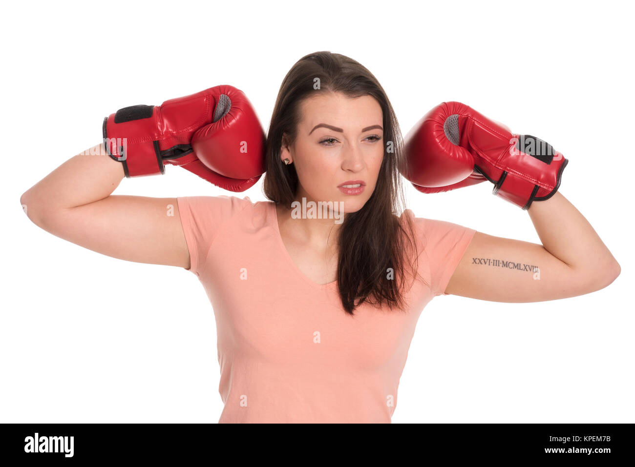 Junge Frau mit roten Boxhandschuhe Stockfoto