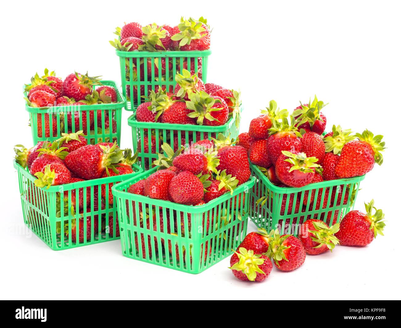 Frische ganze individuelle Erdbeeren Stockfoto