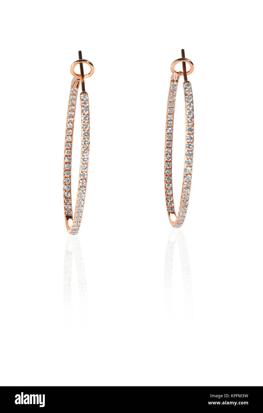 Durchbohrte Diamanten Ohrringe in Roségold Stockfoto