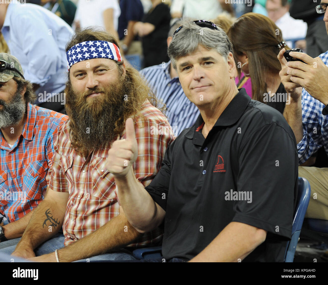 FLUSHING NY-SEPTEMBER 04: Duck's Dynasty Willie Robertson, Sean Hannity, Tag elf der 2014 US Open am USTA Billie Jean King National Tennis Center am 4. September 2014 in der Nähe der Queens Borough von New York City People: Willie Robertson, Sean Hannity Stockfoto