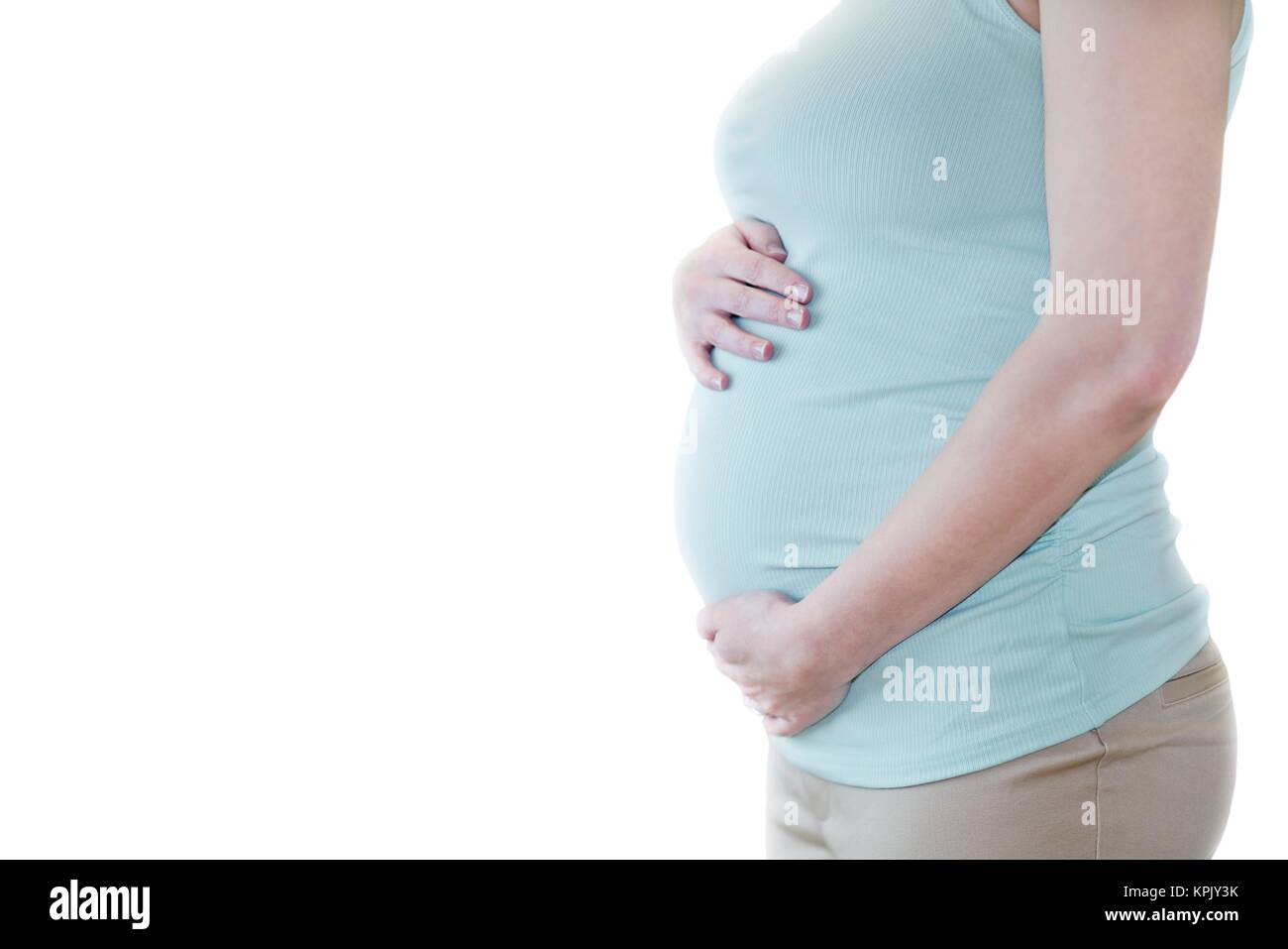 Schwangere Frau mit Hände auf Bauch, 7/8-Ansicht. Stockfoto