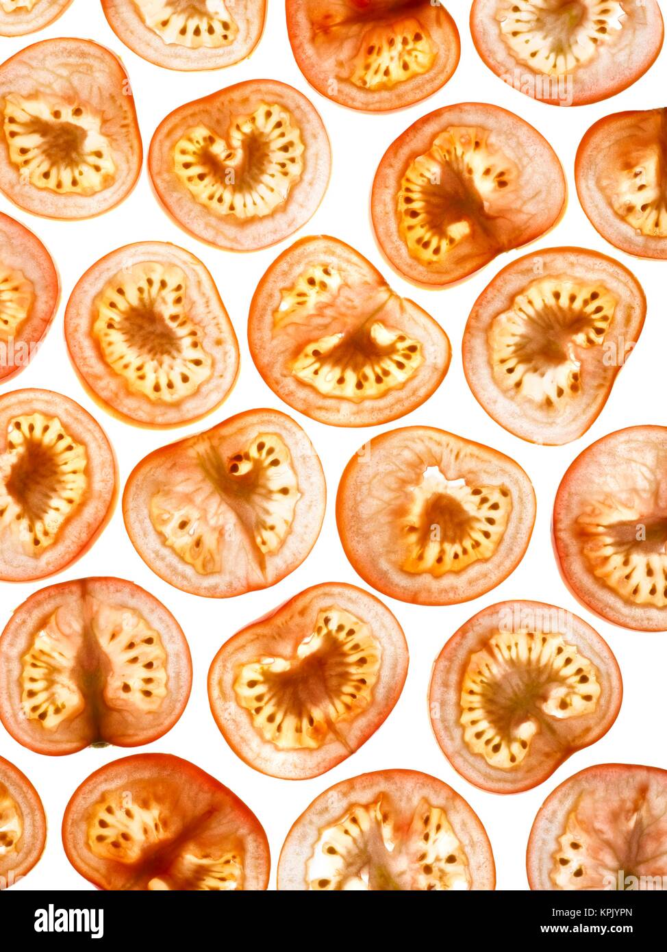 Tomatenscheiben auf einem weißen Hintergrund. Stockfoto