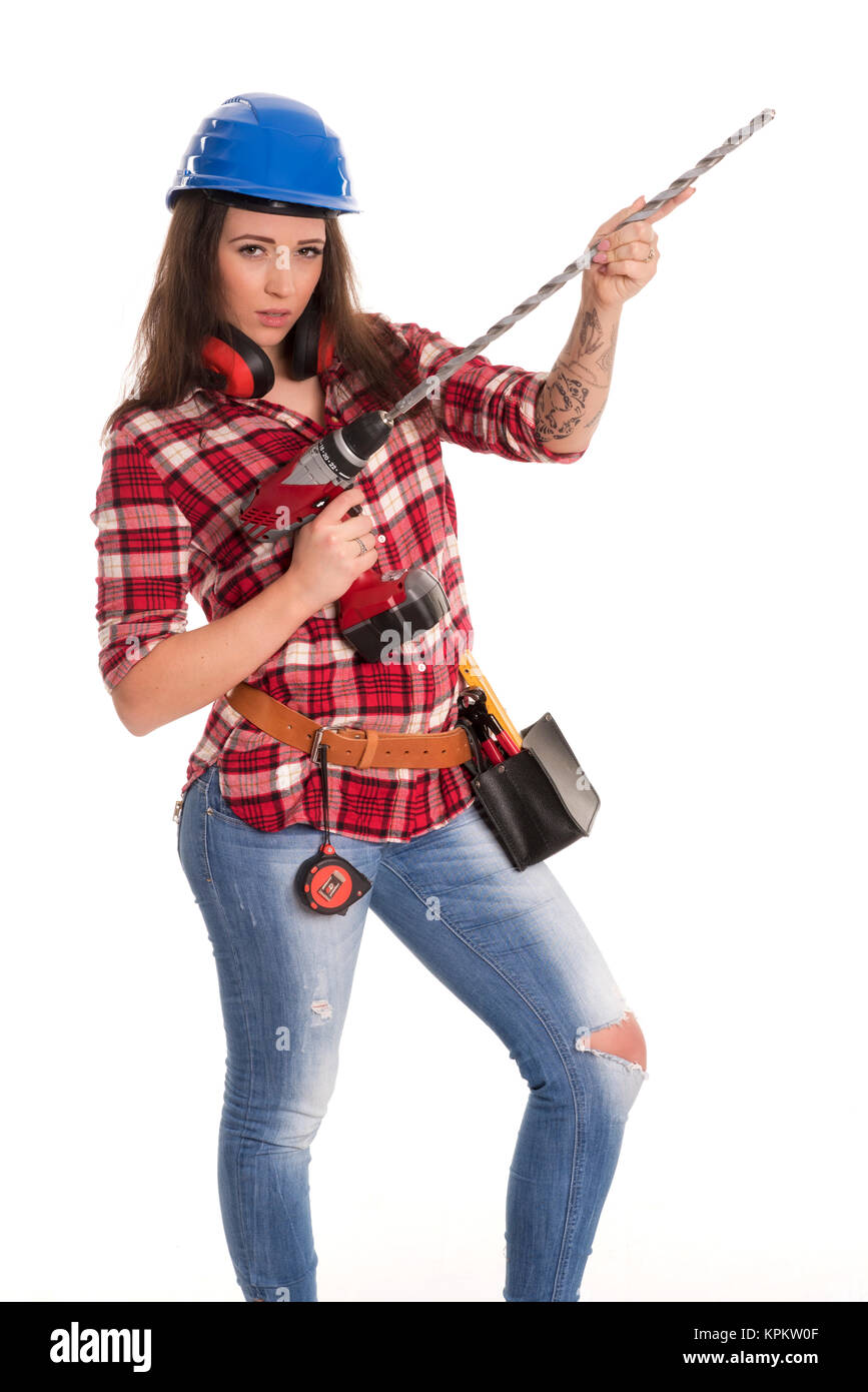 Weibliche Handwerker mit dem Bau Helm mit einem Bohrer Stockfoto