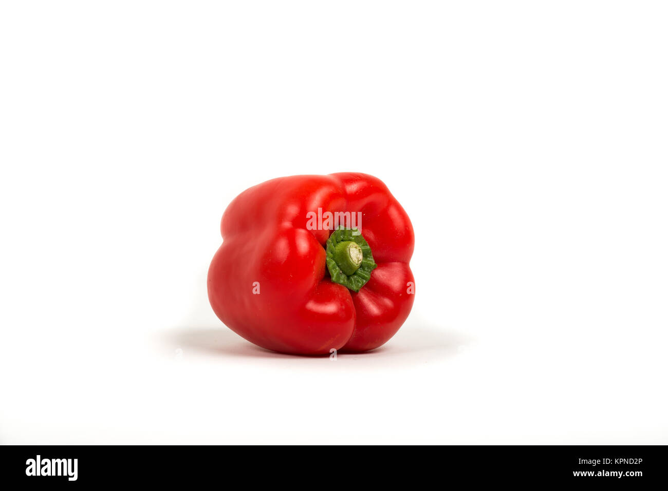 Rote Paprika auf Weiß Stockfoto