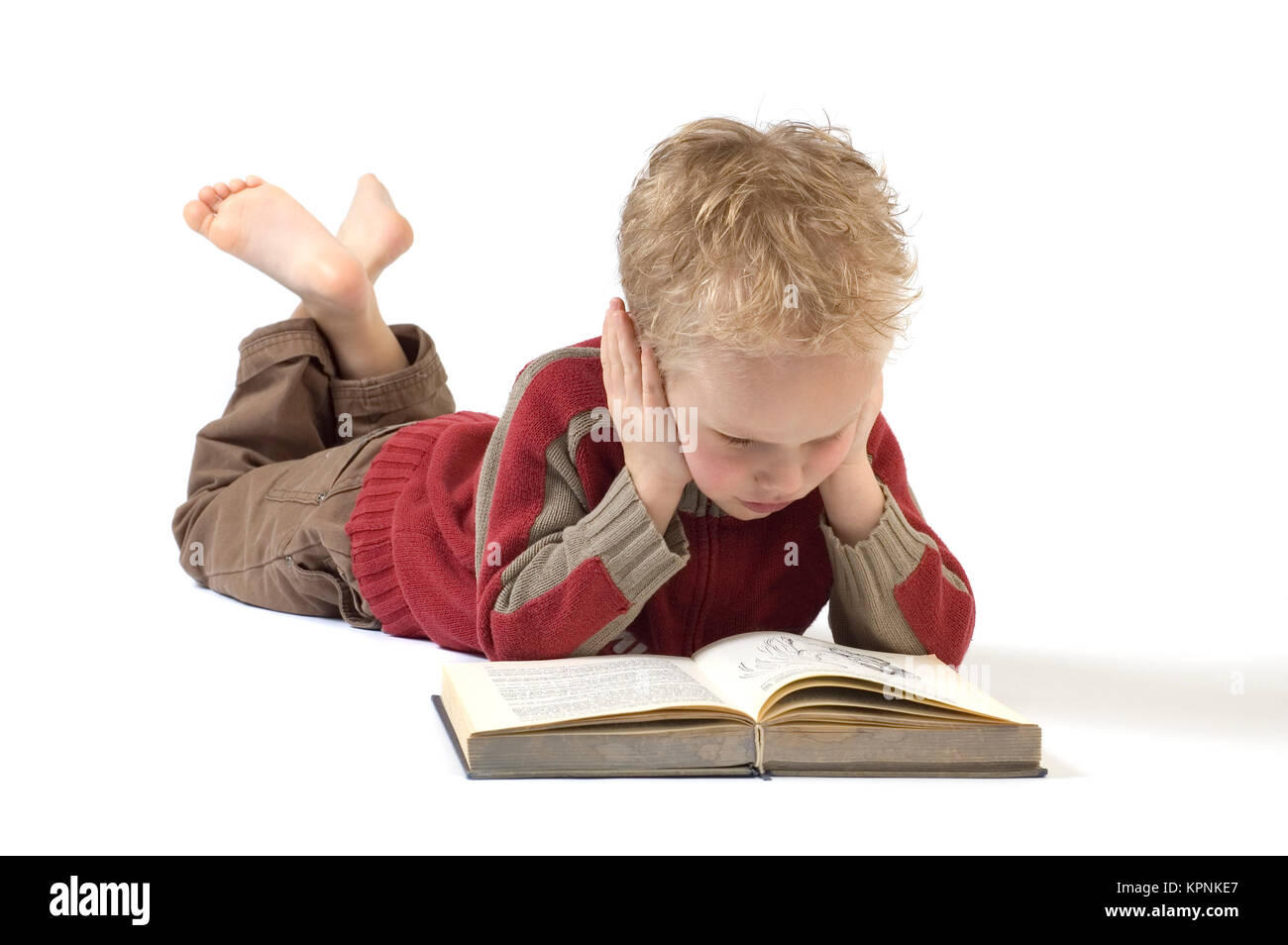Junge, ein Buch zu lesen 4. Stockfoto