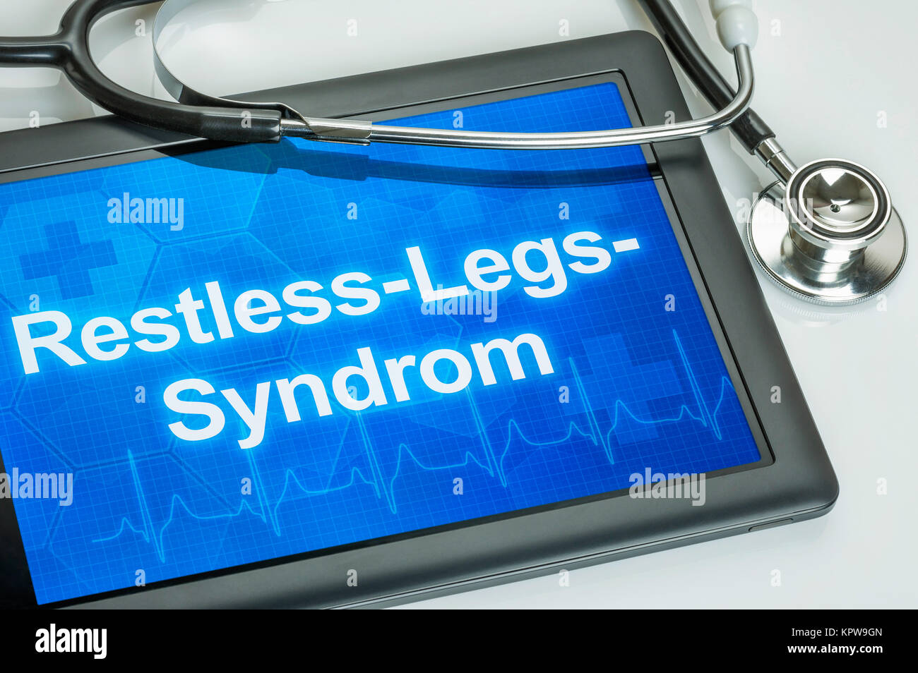 Tablet-PC mit der Diagnose Restless-Legs-Syndrom mit dem Display Stockfoto