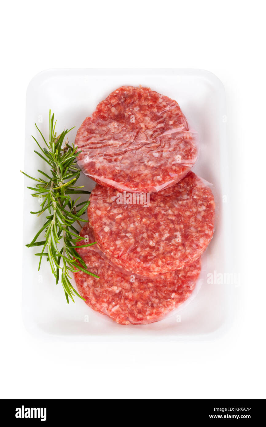 Rohe Hamburger und Rosmarin. Stockfoto