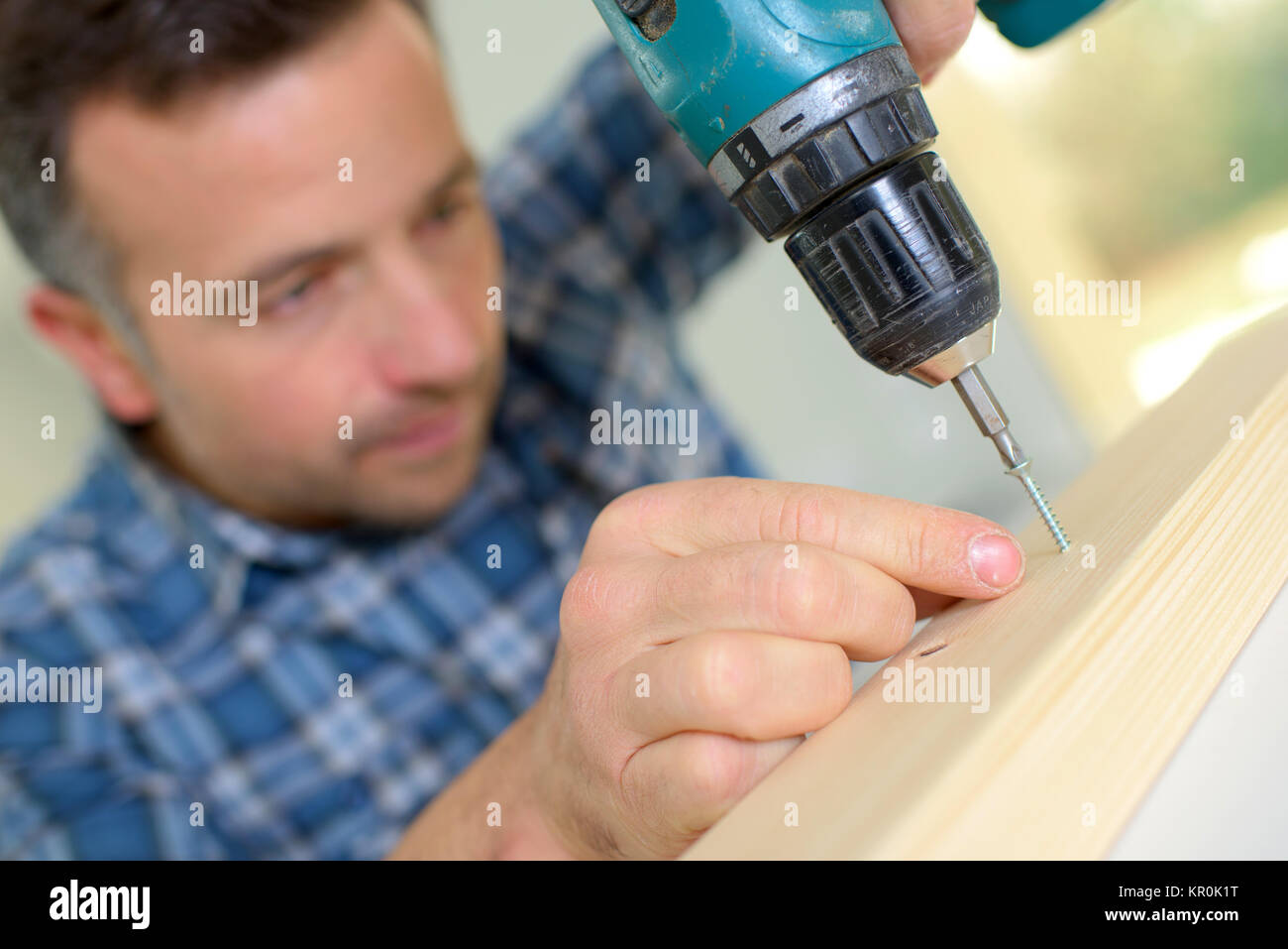 Tischler, Bohren Stockfoto