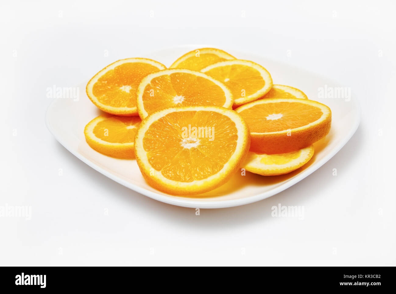 Orangen auf Platte Stockfoto
