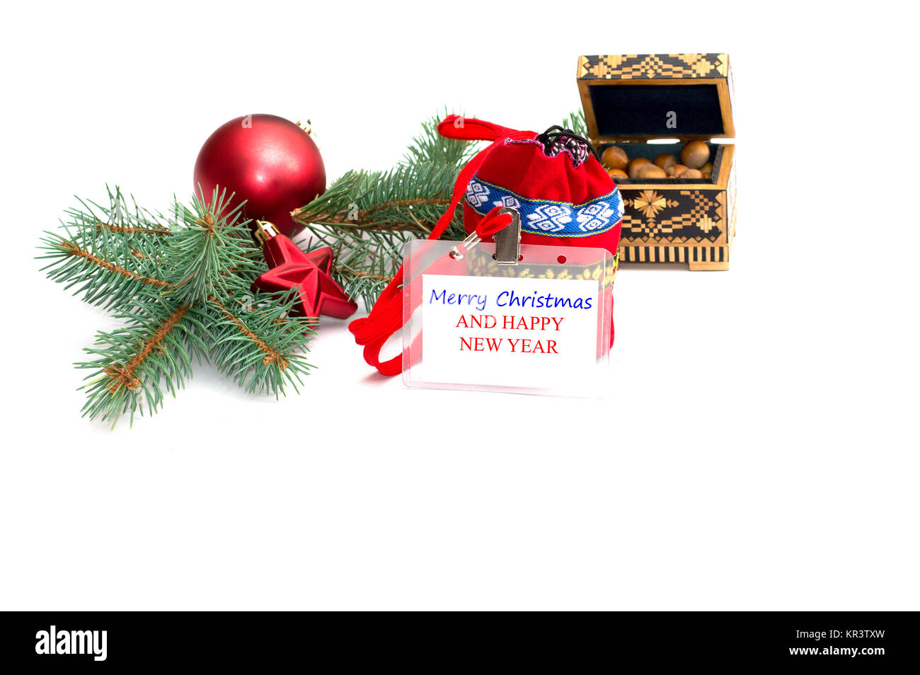 Die Platte mit einer Inschrift, Weihnachten, nutlets und ein Nadelholz Zweig Stockfoto