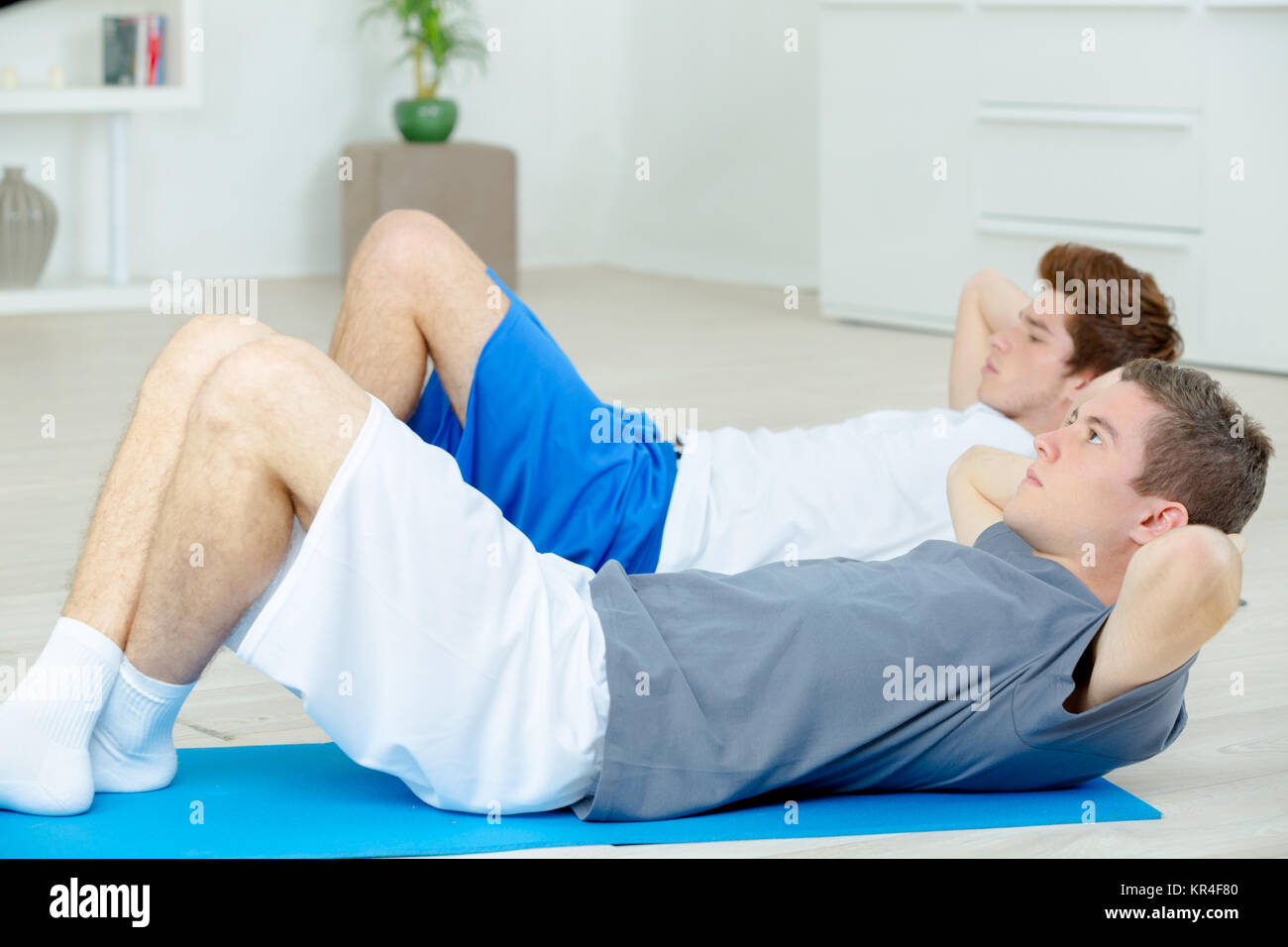 Zeit, einige Sit-ups zu tun Stockfoto