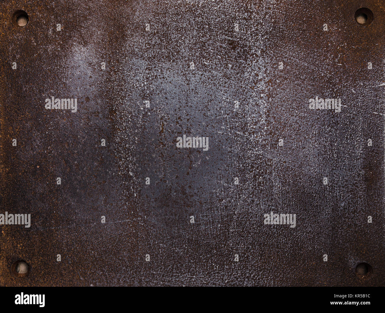 Schweren rauhen grunge Hintergrund Metallplatte mit Schrauben. Stockfoto