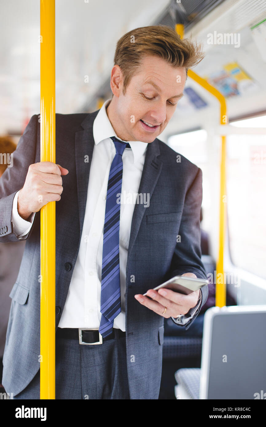 Unternehmer im Zug Stockfoto