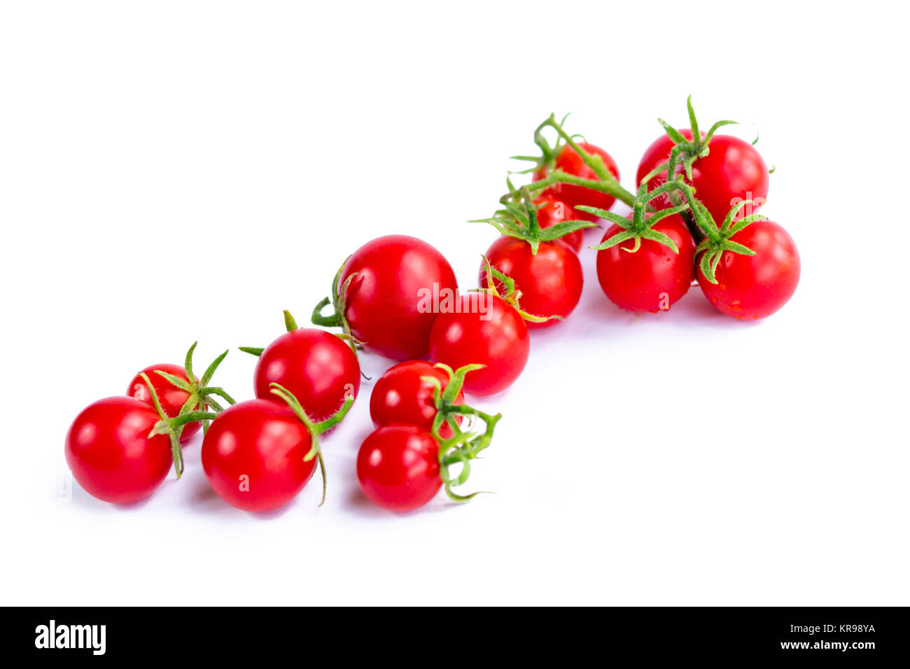 Ansammlung von Tomaten auf weißem Hintergrund Stockfoto