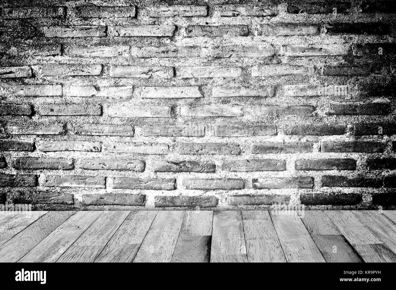 Brick Wall und Holzboden Stockfoto