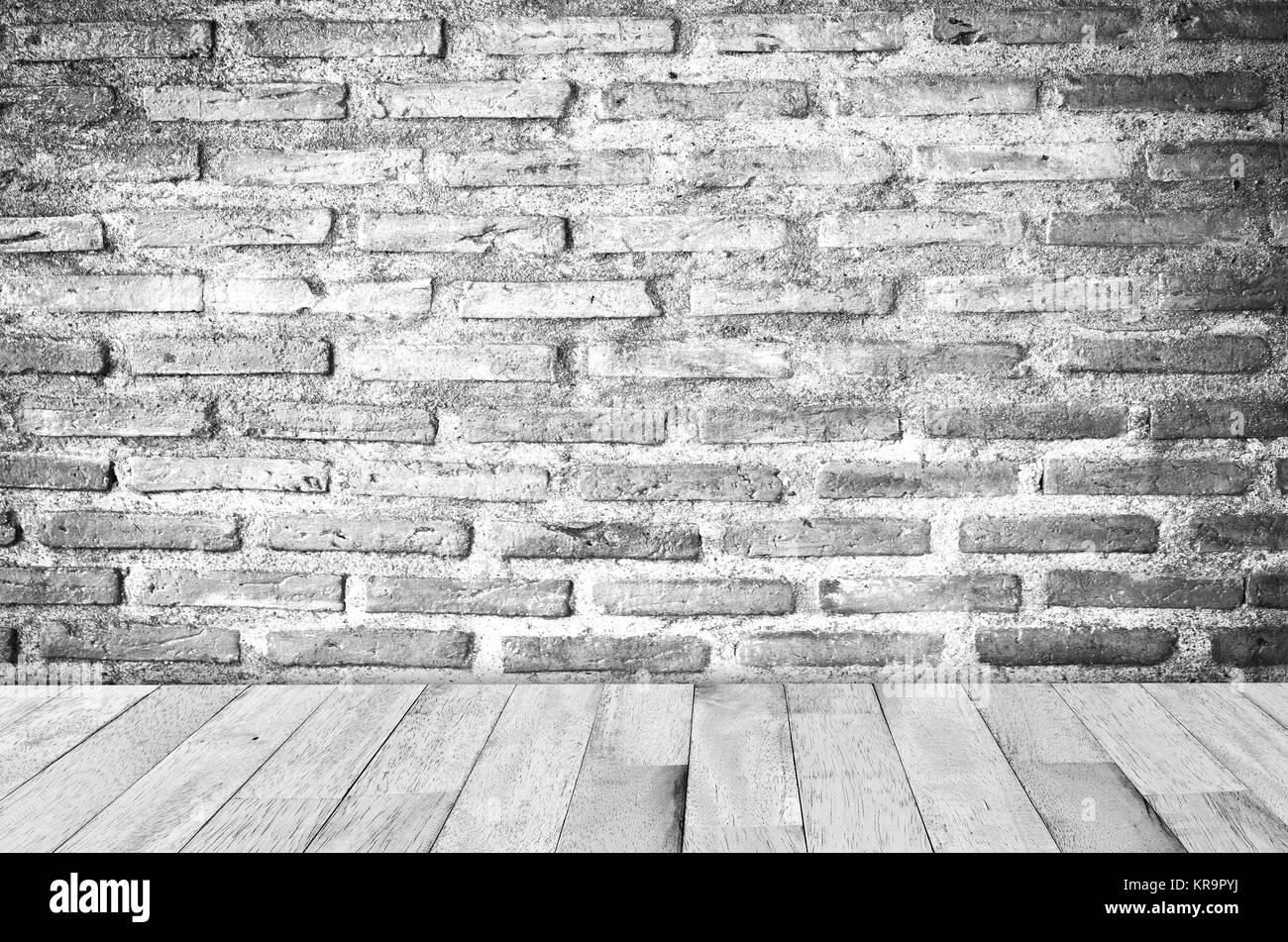 Brick Wall und Holzboden Stockfoto