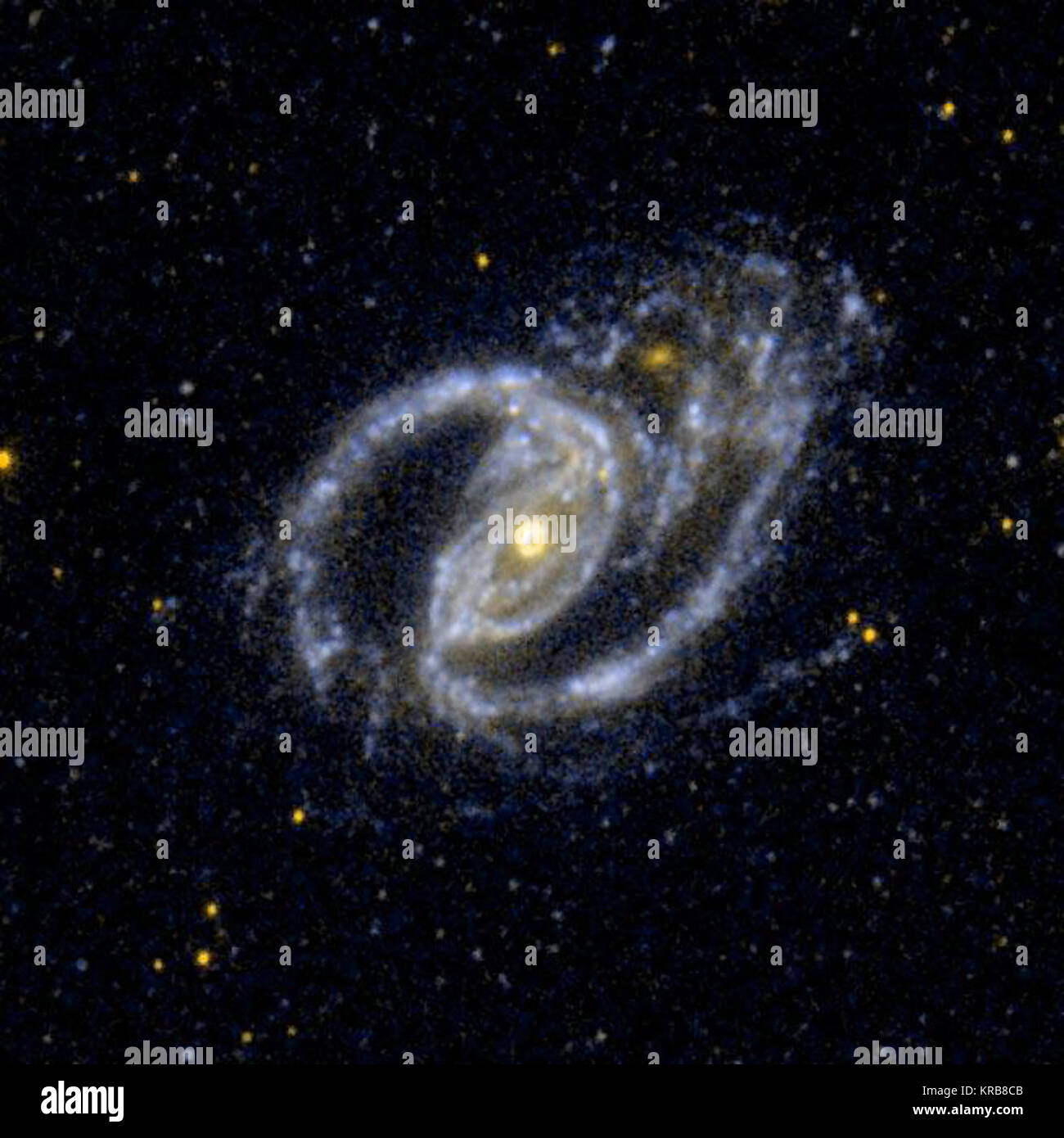 Diese UV-Bild von der NASA Galaxy Evolution Explorer zeigt die Interaktion paar NGC 1097 ist eine Spiralgalaxie, und die Kleine elliptische Begleiter Galaxie NGC 1097 A. NGC 1097 EIN Stockfoto