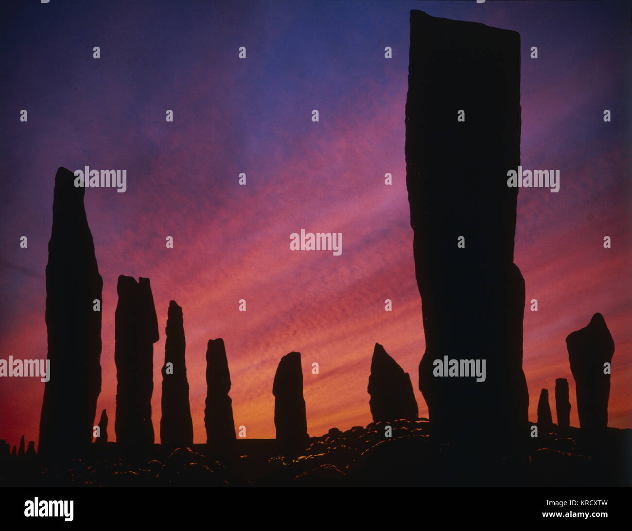 Sonnenuntergang über der alten Steine von Callanish Stone Circle, Isle of Lewis, Äußere Hebriden, Schottland. 1980 Stockfoto